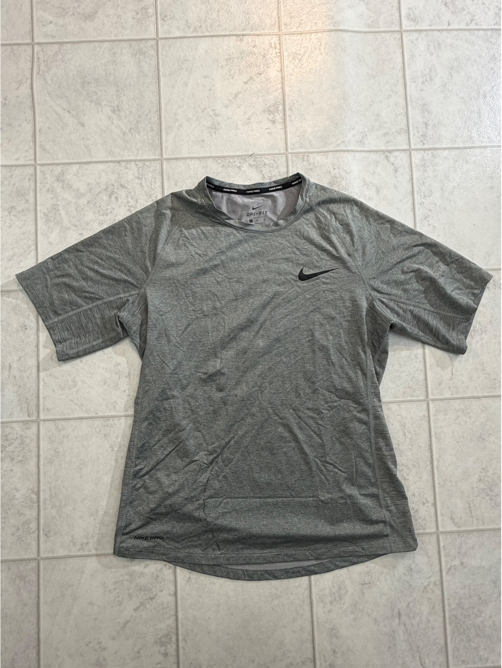 Nike Dri Fit gray short sleeve athletic shirt size L